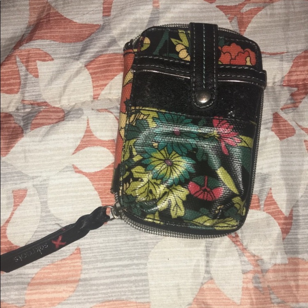 Sakroots wallet. Very pretty, fairly used! :)